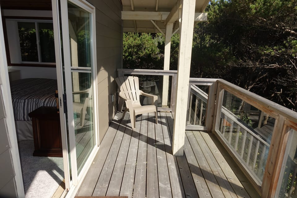 Hear the waves from the private deck with a side entrance to the master bedroom.