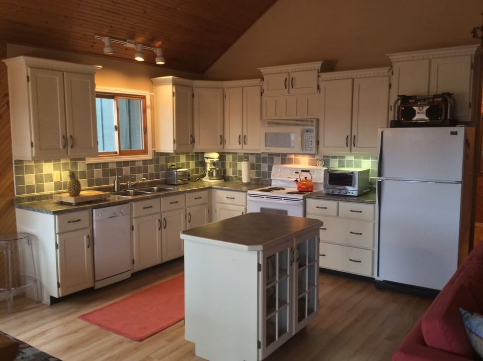 Fully stocked gourmet kitchen