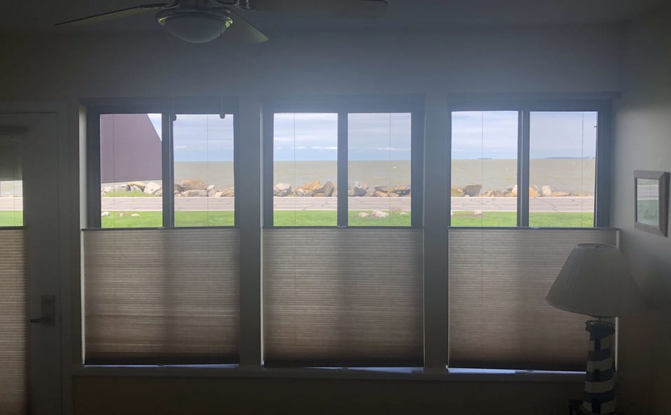 Window treatments are top down bottom up for privacy with a view.