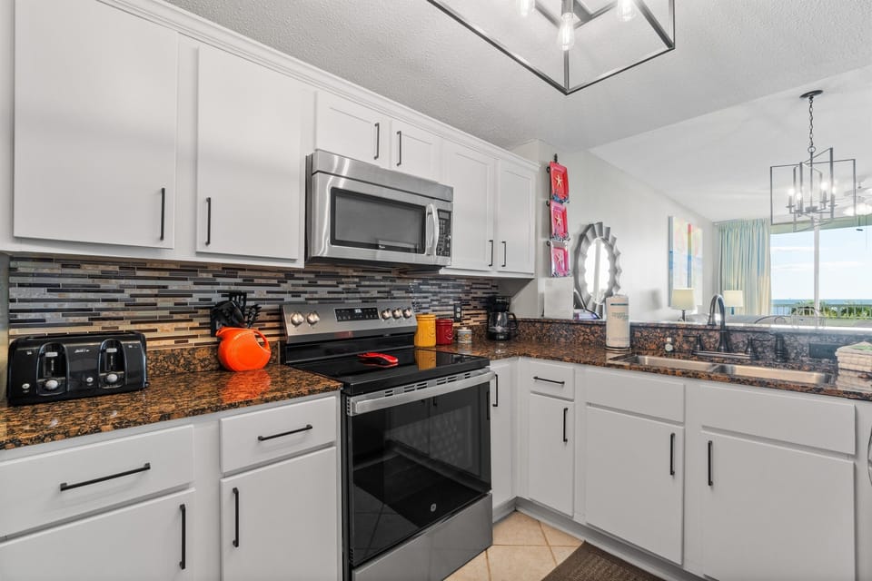 toaster, stove, microwave, sink, disposal