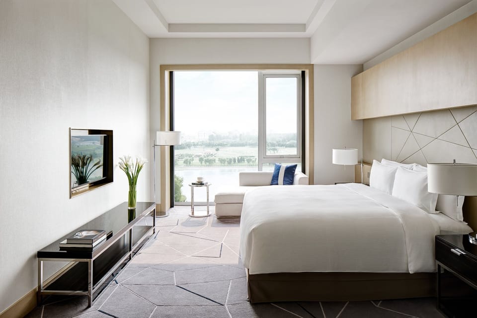 Executive Suite | 1 bedroom, premium bedding, down comforters, in-room safe