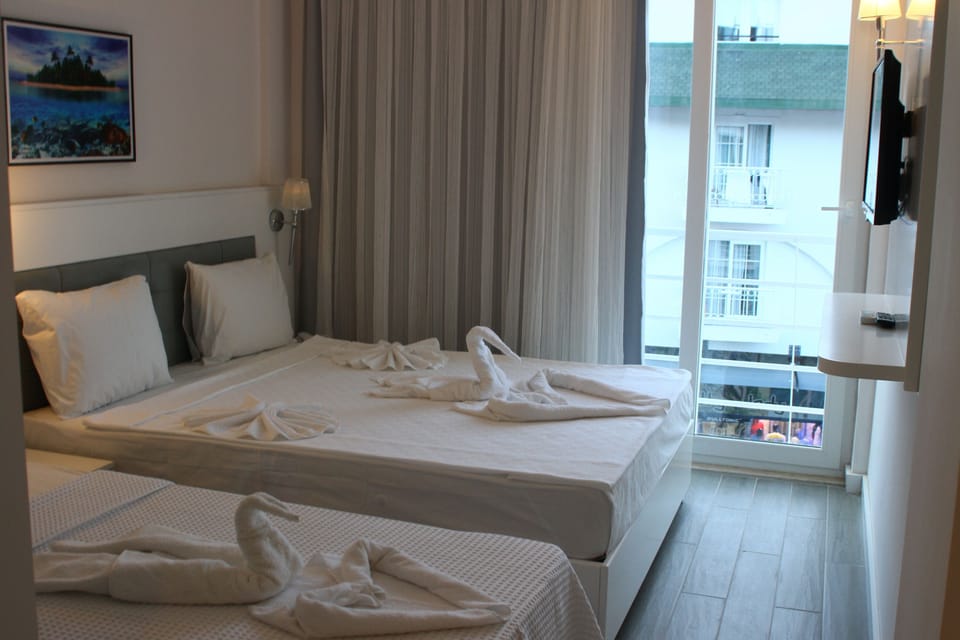 Superior Triple Room, Mountain View | 1 bedroom, minibar, desk, free WiFi
