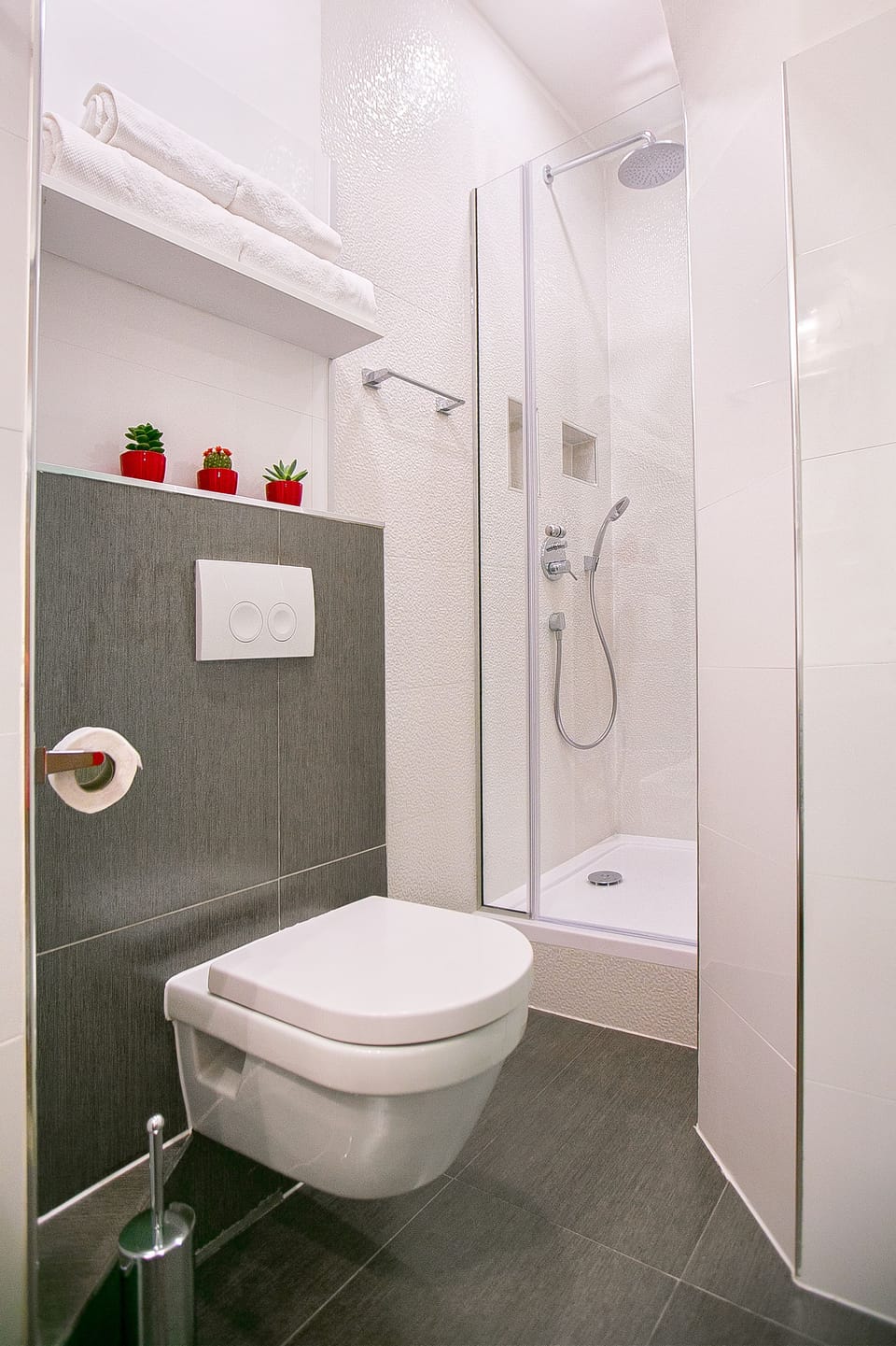 Exclusive Apartment, City View | Bathroom | Shower, hair dryer, slippers, bidet