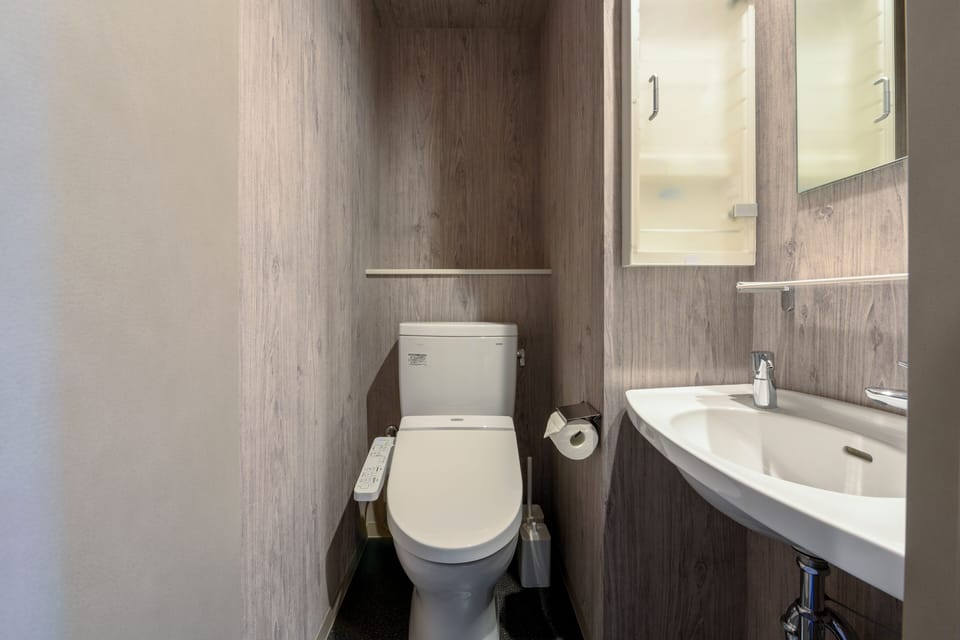 Separate tub and shower, free toiletries, hair dryer, slippers