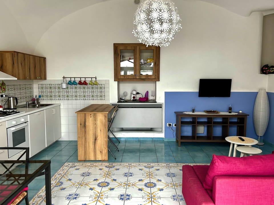 Apartment, 1 Bedroom, Jetted Tub, Ground Floor (Sirentum) | Living area | Flat-screen TV