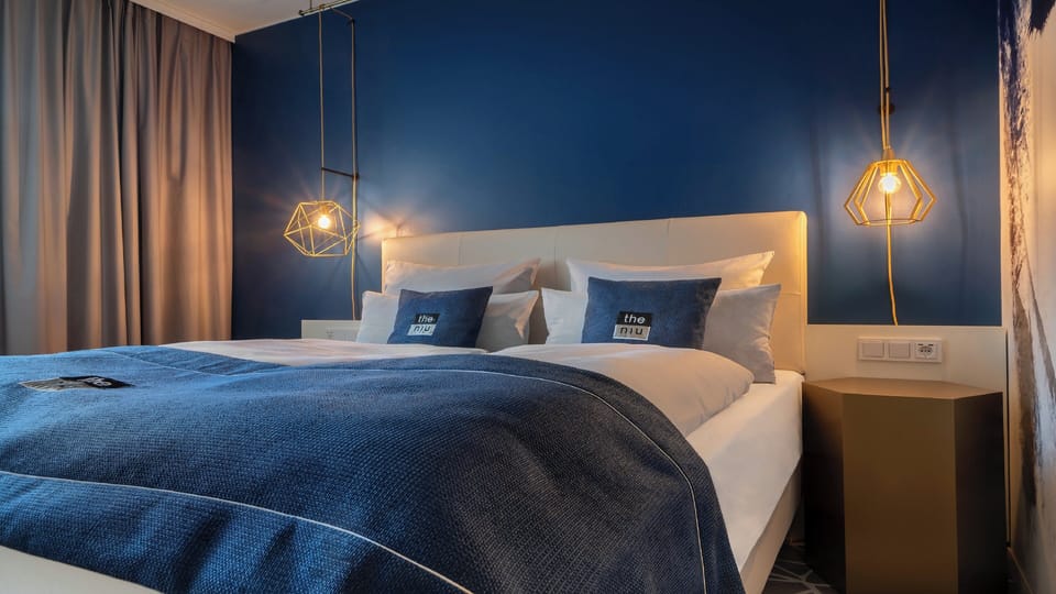 Premium bedding, in-room safe, blackout drapes, soundproofing