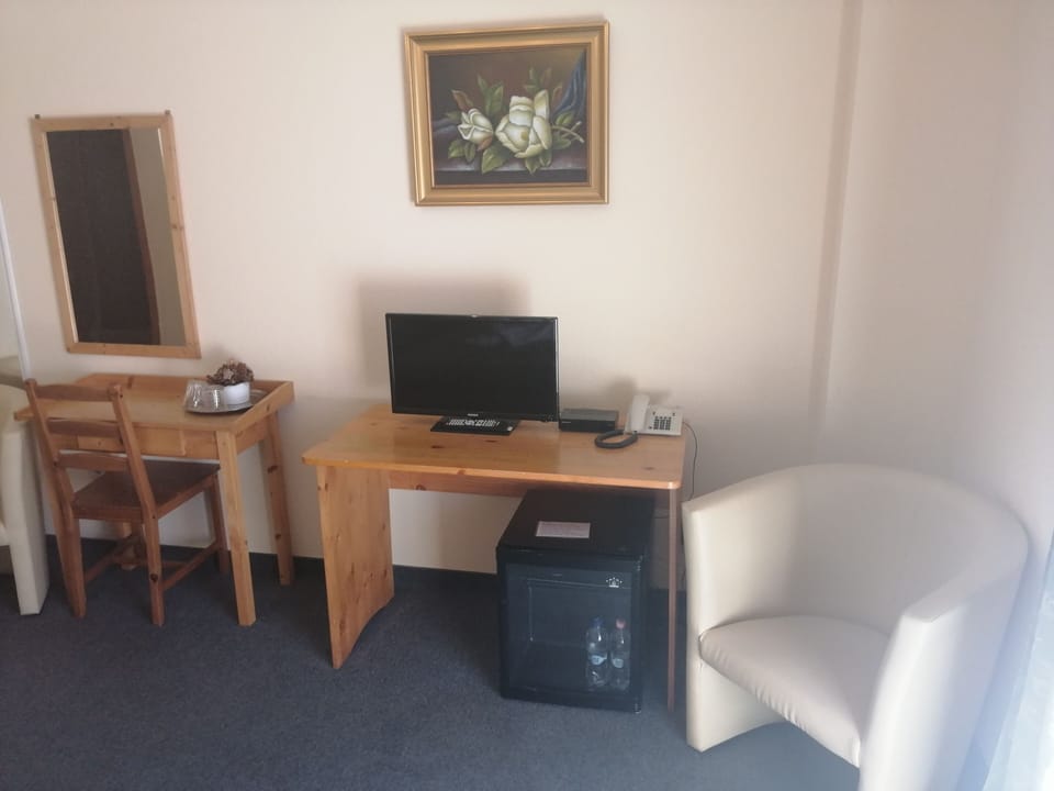Minibar, desk, blackout drapes, soundproofing