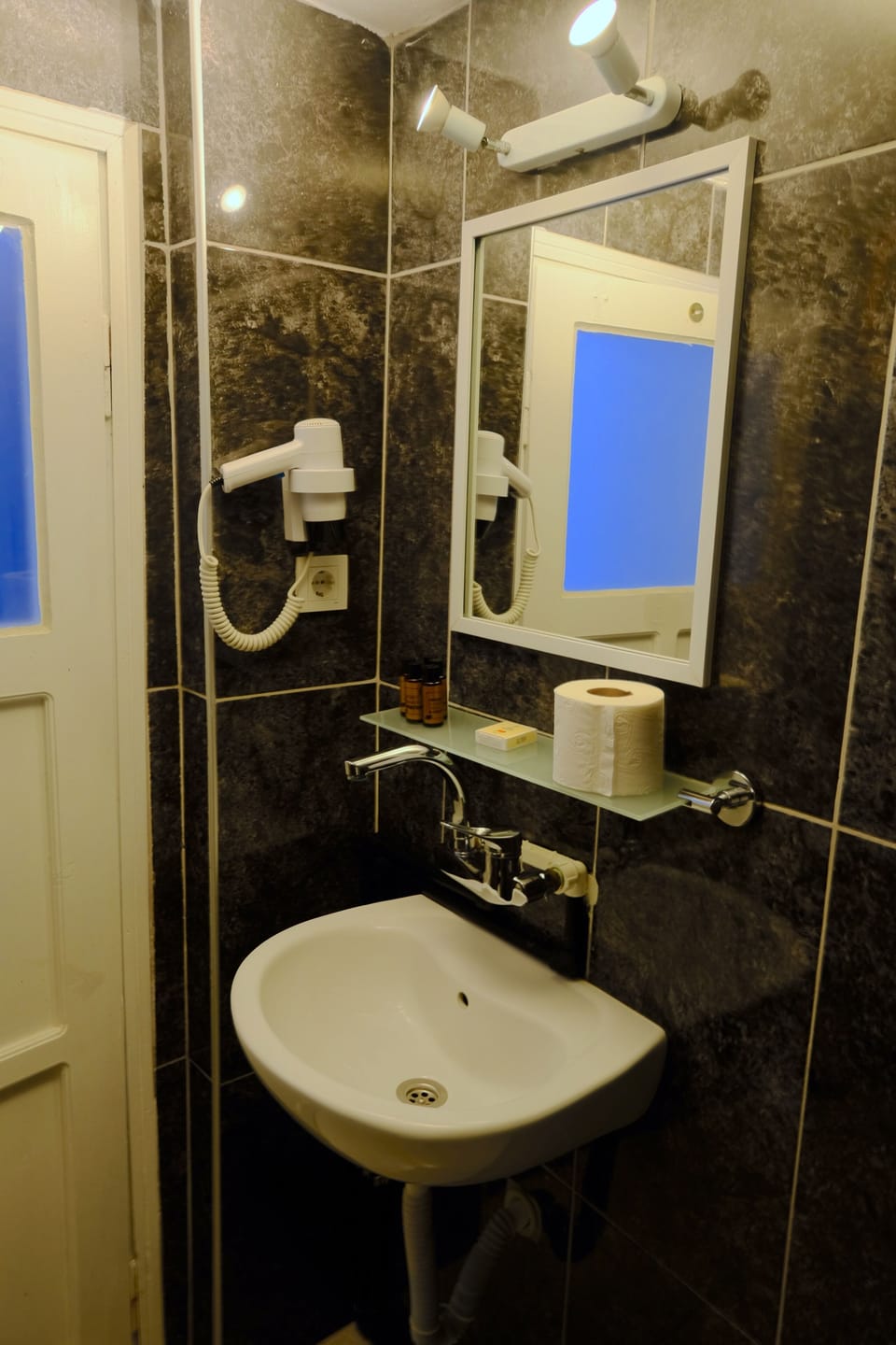 Shower, free toiletries, hair dryer, slippers