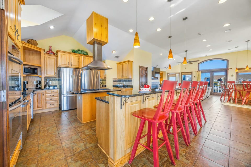 Gather around this spacious kitchen island where your group can cook, chat, and create memories together.