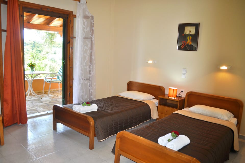 The second bedroom. Exit also to the front terrace.