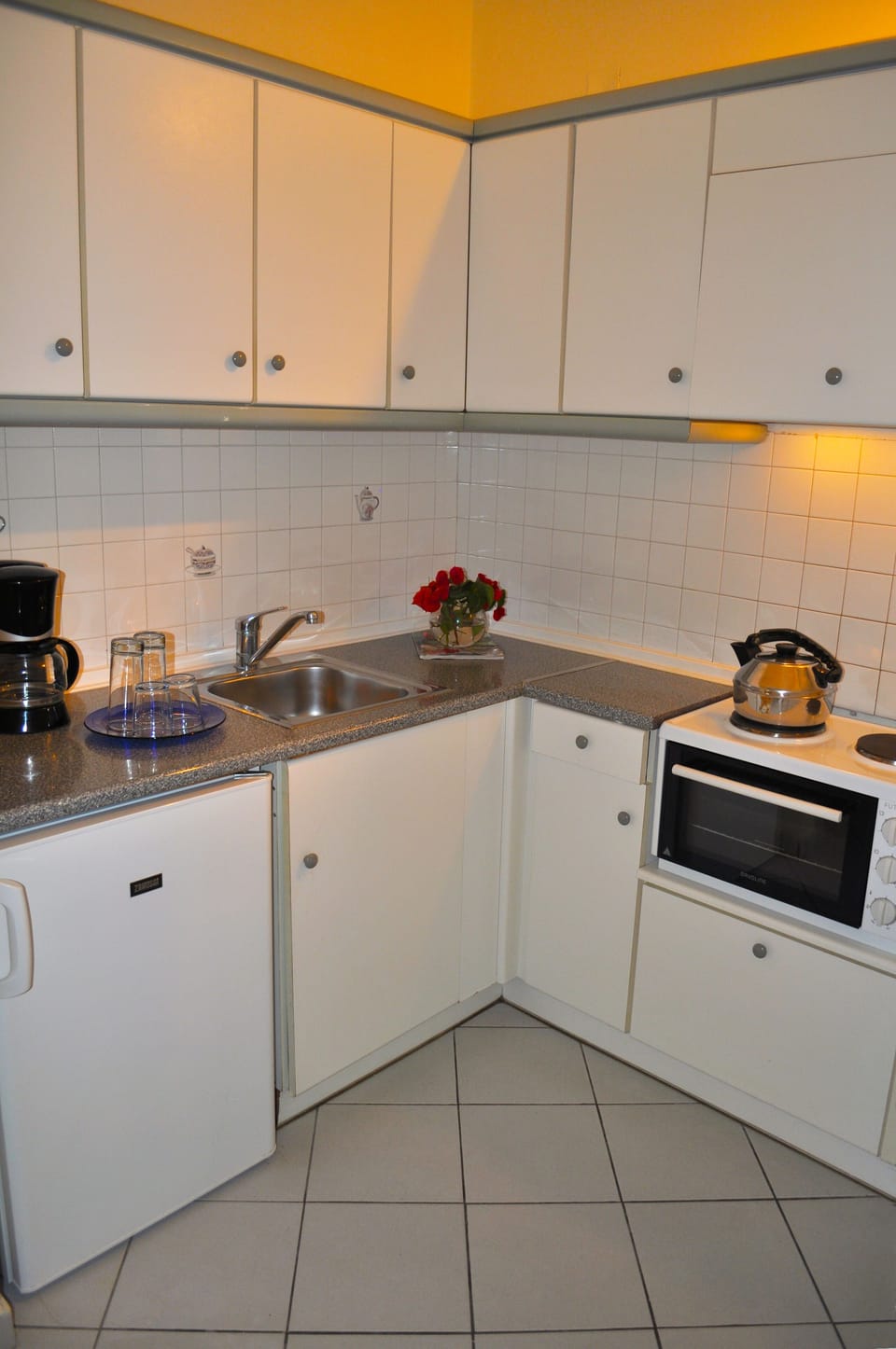 The large, well equipped separate kitchen