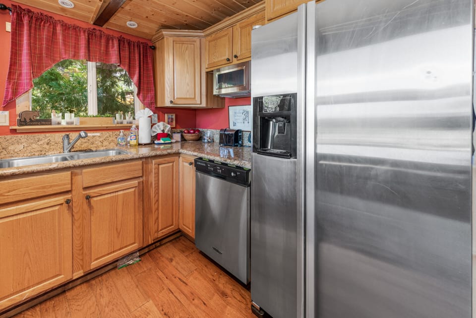 Kitchen - A fully equipped kitchen, all with granite countertops.