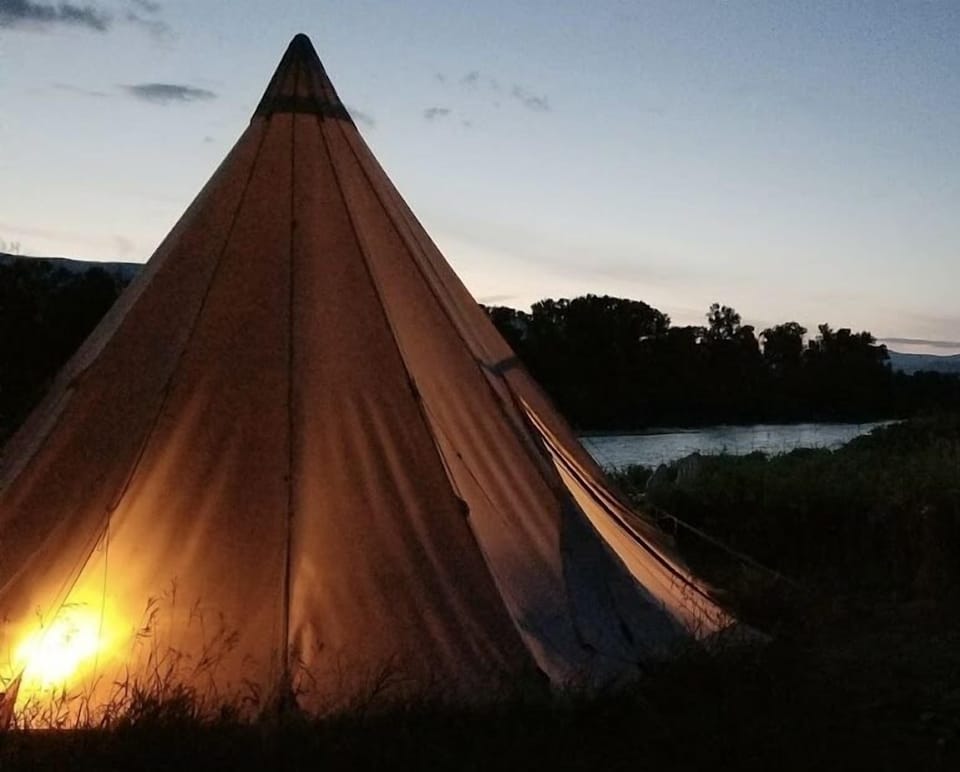 Luxury Tent | Down comforters, pillowtop beds, individually decorated