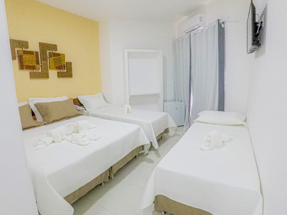 Apartment (Quadruplo) | Minibar, blackout drapes, soundproofing, iron/ironing board