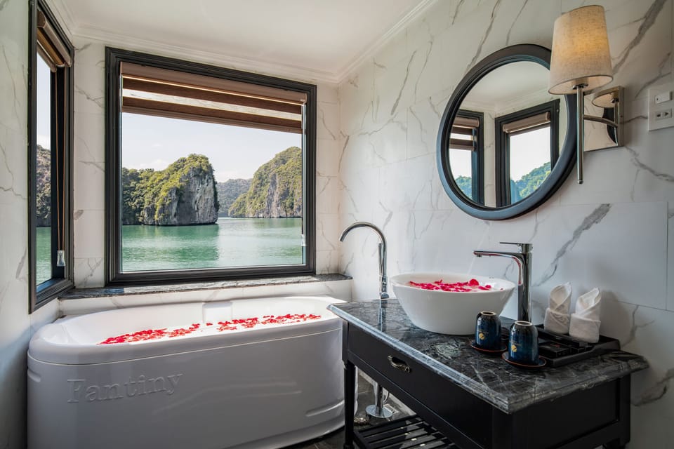 Combined shower/tub, bathrobes, slippers, bidet