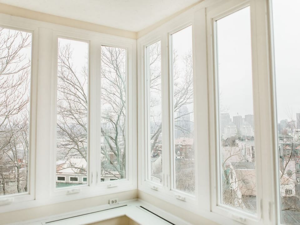 The master bedroom has a full wall of windows!