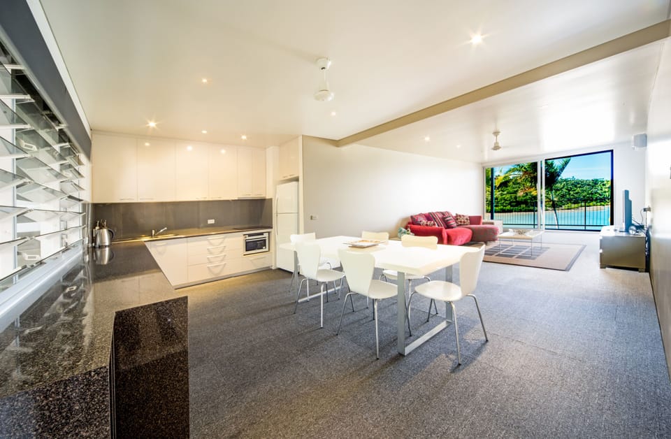Panoramic Apartment, Ocean View | Living area | Flat-screen TV