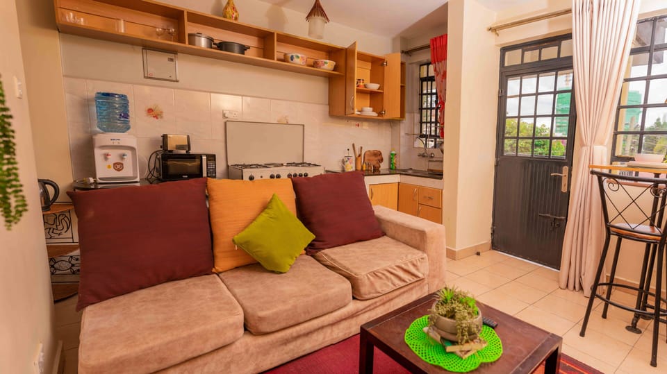 Apartment, 1 Bedroom | Living area | 40-inch Smart TV with satellite channels, TV