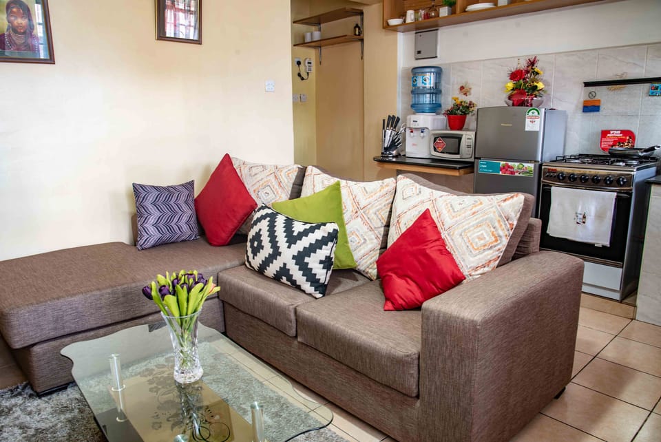 Apartment, 1 Bedroom | Living area | 40-inch Smart TV with satellite channels, TV