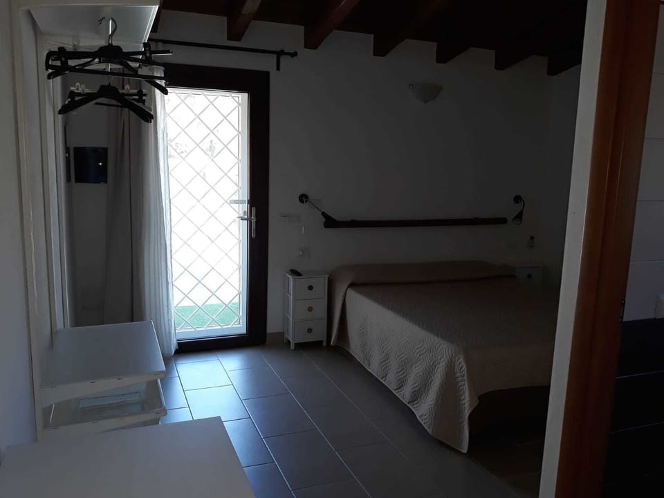 Standard Double Room, 1 Queen Bed | Individually decorated, individually furnished, blackout drapes