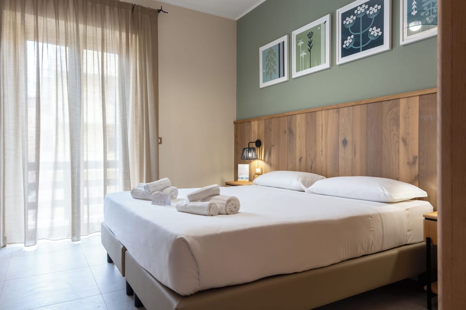 Double or Twin Room, Balcony | 1 bedroom, in-room safe, desk, laptop workspace
