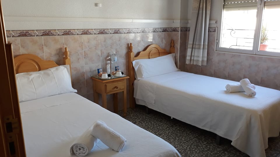 Double Room, Shared Bathroom | Iron/ironing board, free WiFi, bed sheets