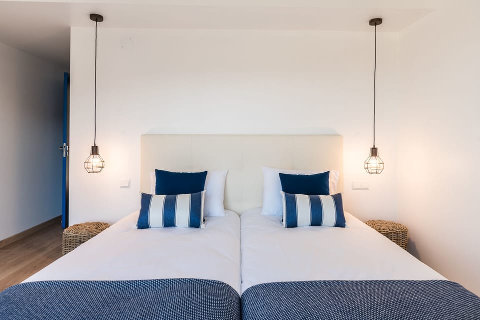 Twin Room, Balcony, Sea View | Desk, individually decorated, individually furnished, bed sheets