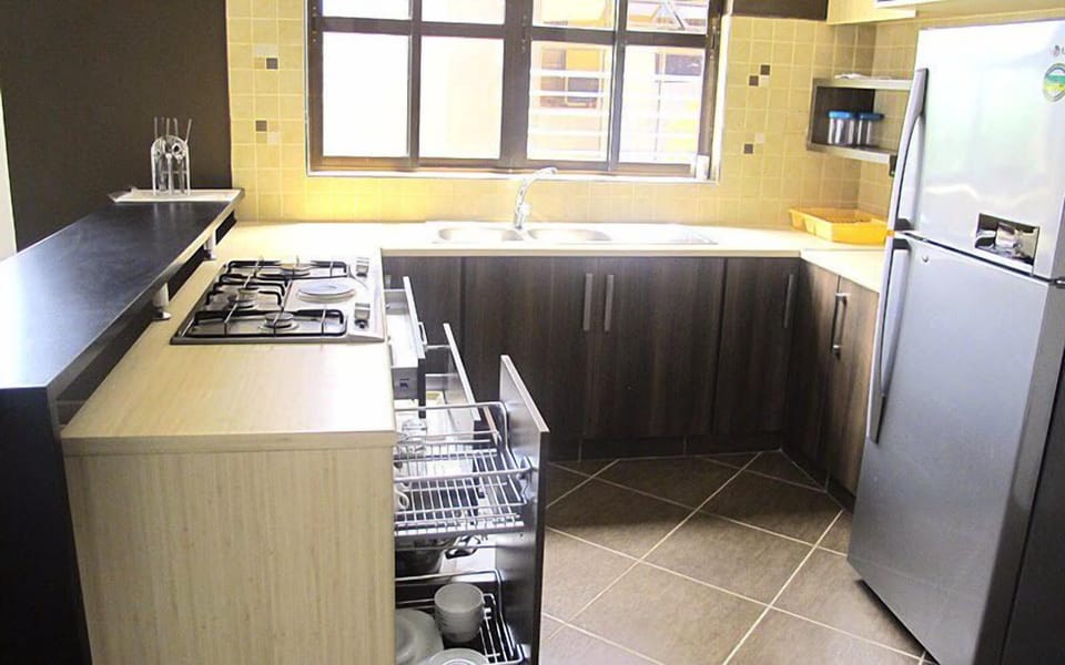 Apartment, 3 Bedrooms | Private kitchen | Full-size fridge, microwave, oven, stovetop