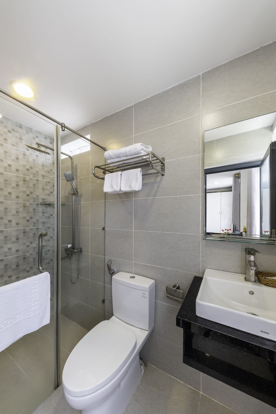 Shower, free toiletries, hair dryer, slippers