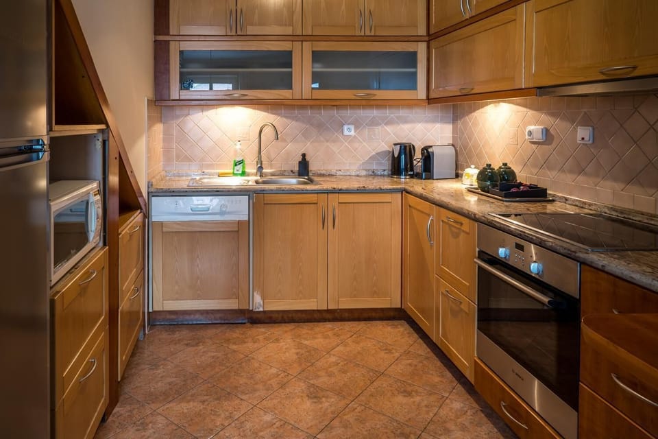 Family Apartment | Private kitchen | Mini-fridge, electric kettle