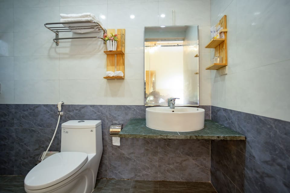 Shower, free toiletries, hair dryer, slippers