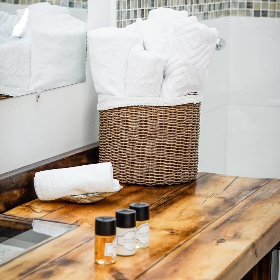 Deluxe Triple Room, Non Smoking | Bathroom amenities | Shower, rainfall showerhead, free toiletries, towels