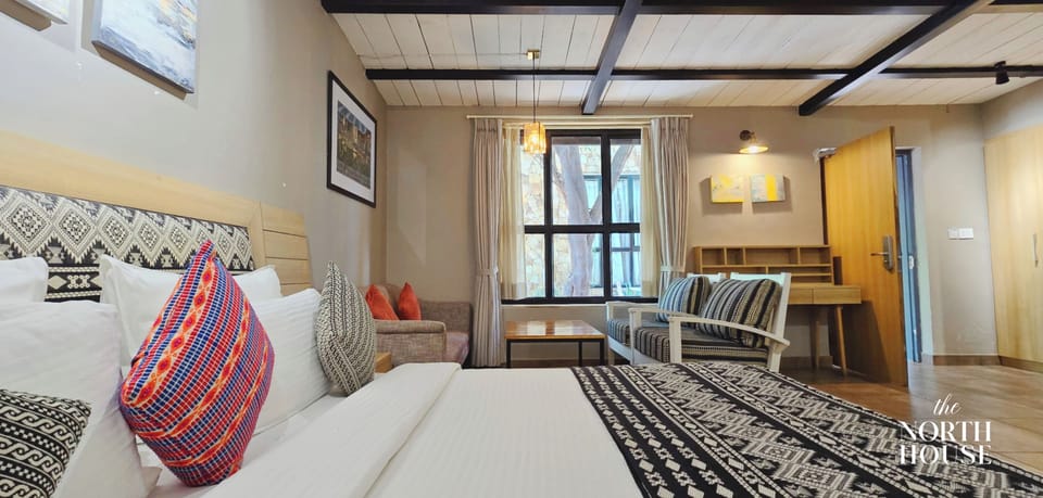Premium Room | Premium bedding, blackout drapes, iron/ironing board, free WiFi