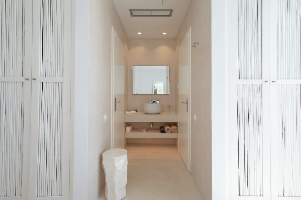 Shower, rainfall showerhead, designer toiletries, hair dryer