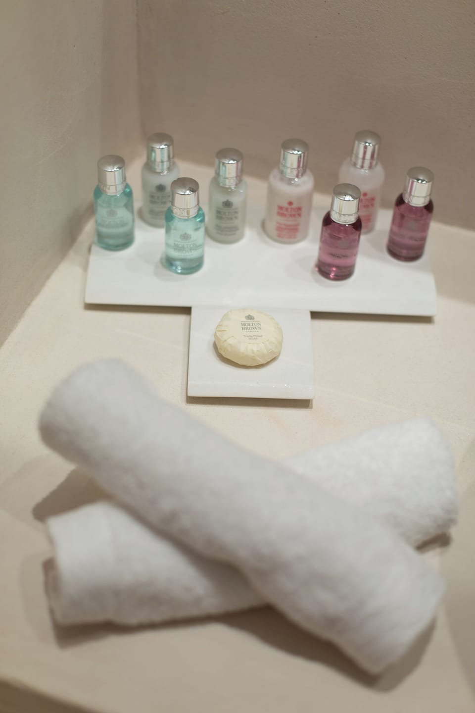 Shower, rainfall showerhead, designer toiletries, hair dryer