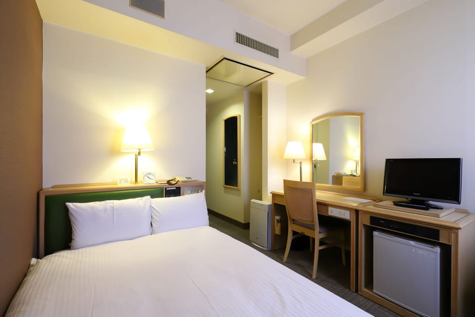 Desk, blackout drapes, iron/ironing board, free WiFi
