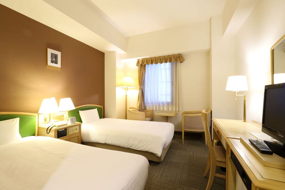 Twin Room, Non Smoking | Desk, blackout drapes, iron/ironing board, free WiFi