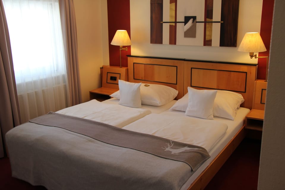 Family Room | Premium bedding, minibar, in-room safe, desk