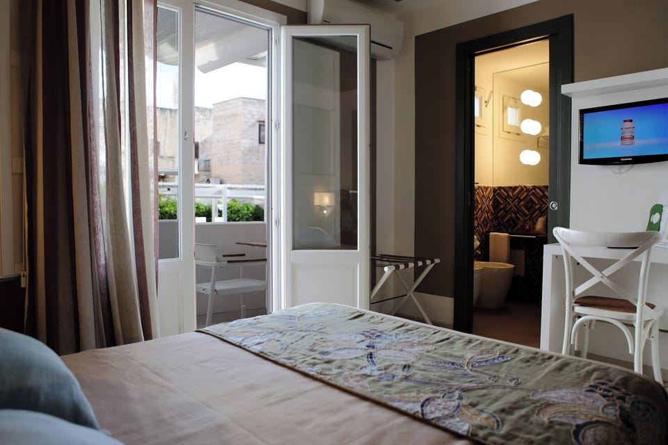 Camera Superior con Balcone | Minibar, in-room safe, desk, soundproofing