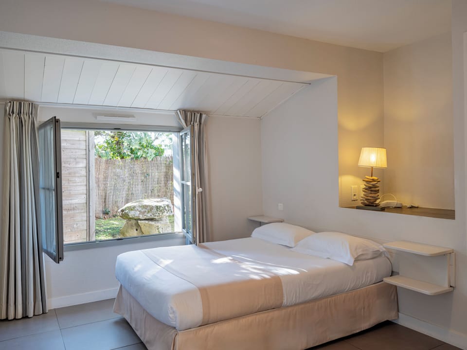 Quadruple Room | Select Comfort beds, desk, blackout drapes, soundproofing