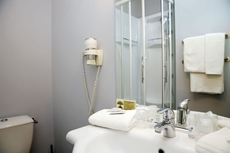 Shower, free toiletries, hair dryer, towels