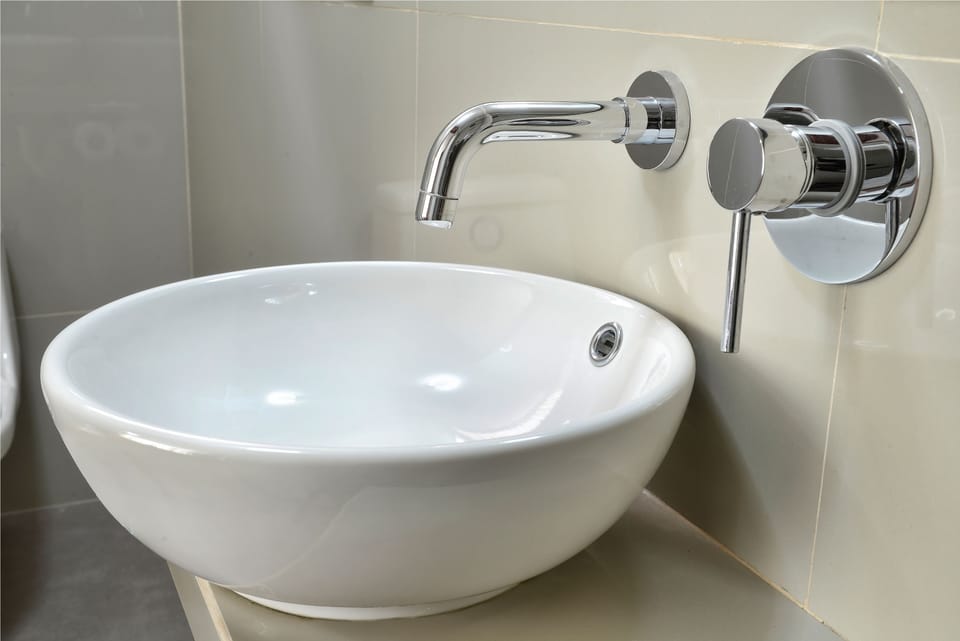 Rainfall showerhead, towels