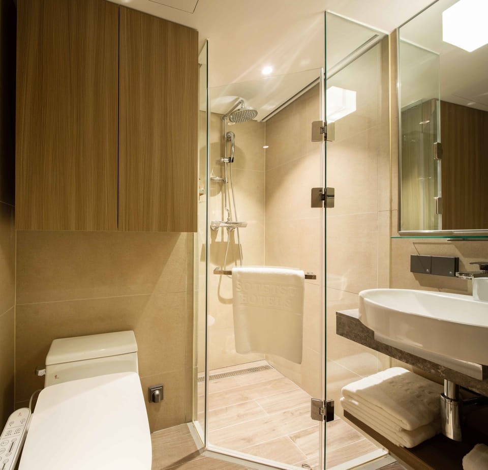 Free toiletries, hair dryer, slippers, electronic bidet