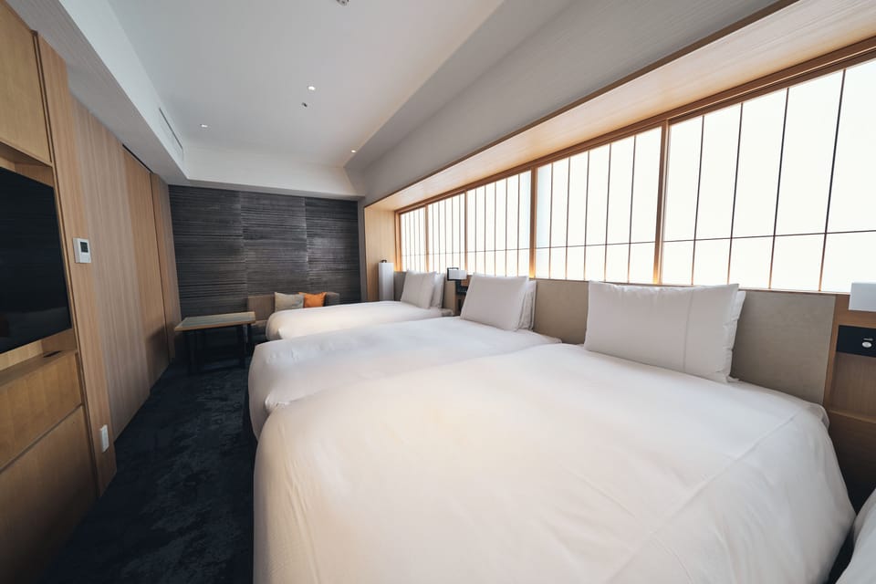 Premier Triple Room, Non Smoking | Down comforters, in-room safe, desk, blackout drapes