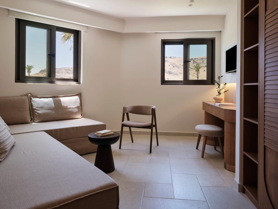 Family Suite, 2 Bedrooms, Garden View | Free minibar, in-room safe, desk, blackout drapes