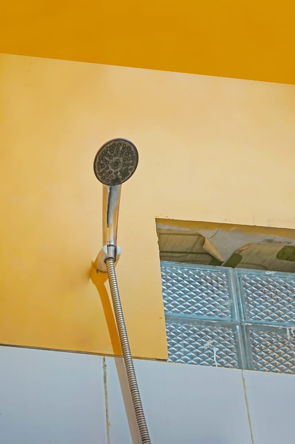 Shower, rainfall showerhead, towels