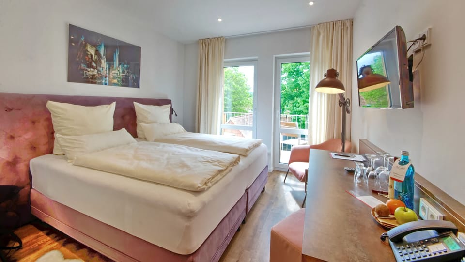 Hypo-allergenic bedding, minibar, in-room safe, desk