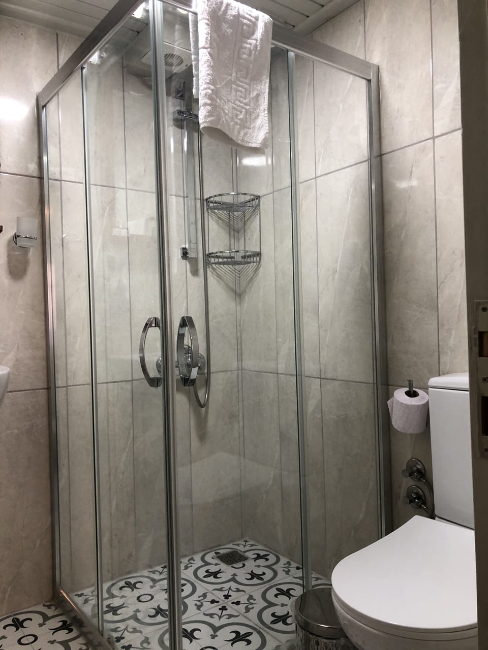 Shower, hair dryer, slippers, soap