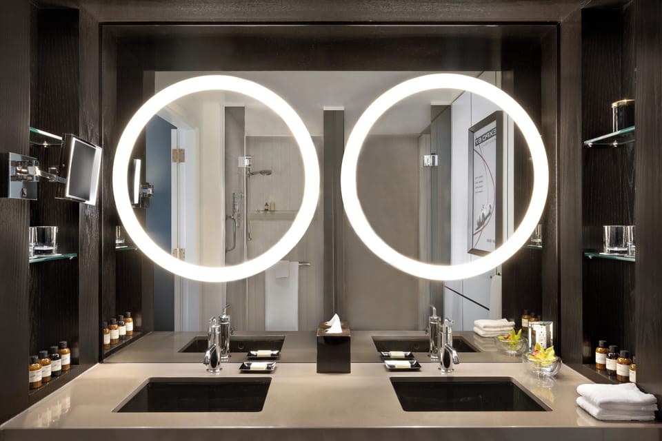 Designer toiletries, hair dryer, bathrobes, slippers