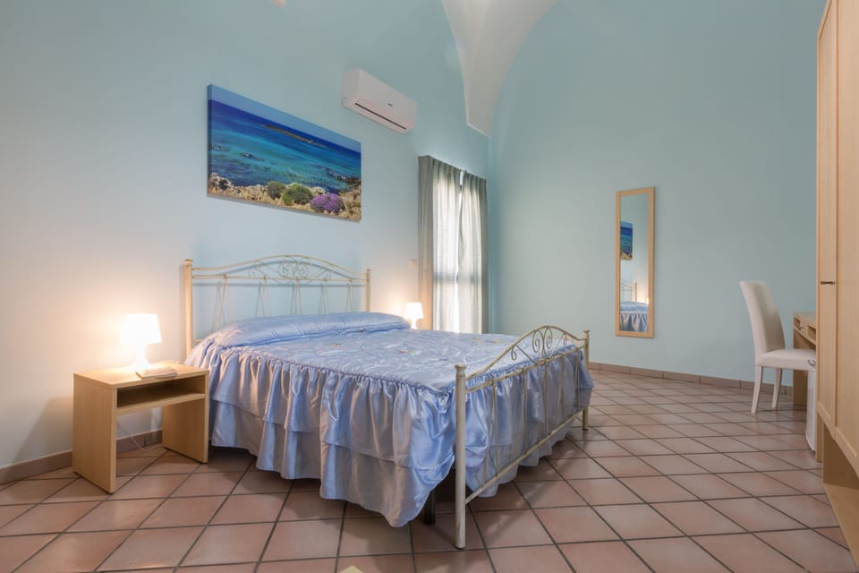 Quadruple Room (Leuka) | 1 bedroom, down comforters, desk, laptop workspace